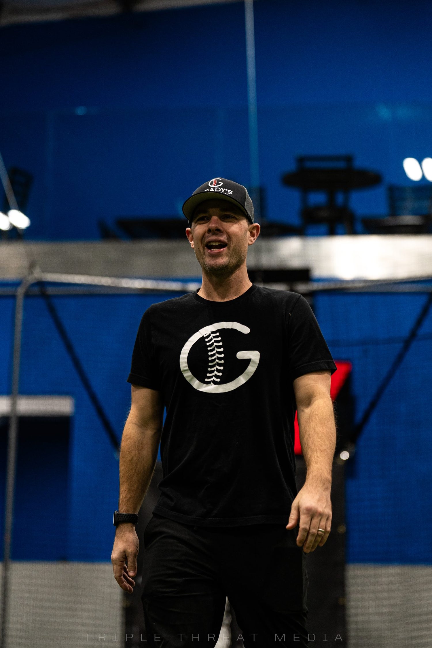 Coach Mike Grady at Grady's Pitching School in the GPS Athletics tee