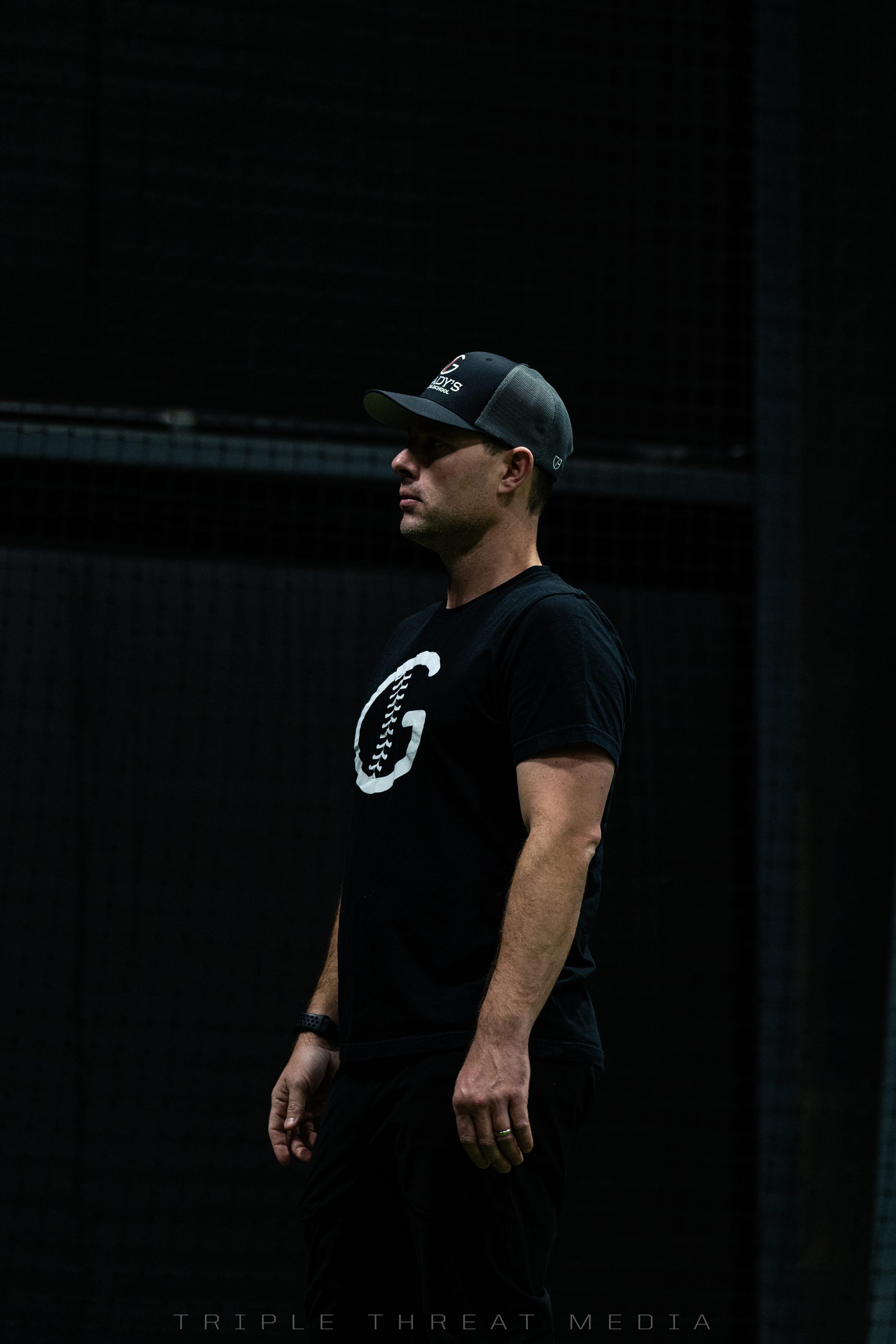 Coach Grady in the cages, ready to work